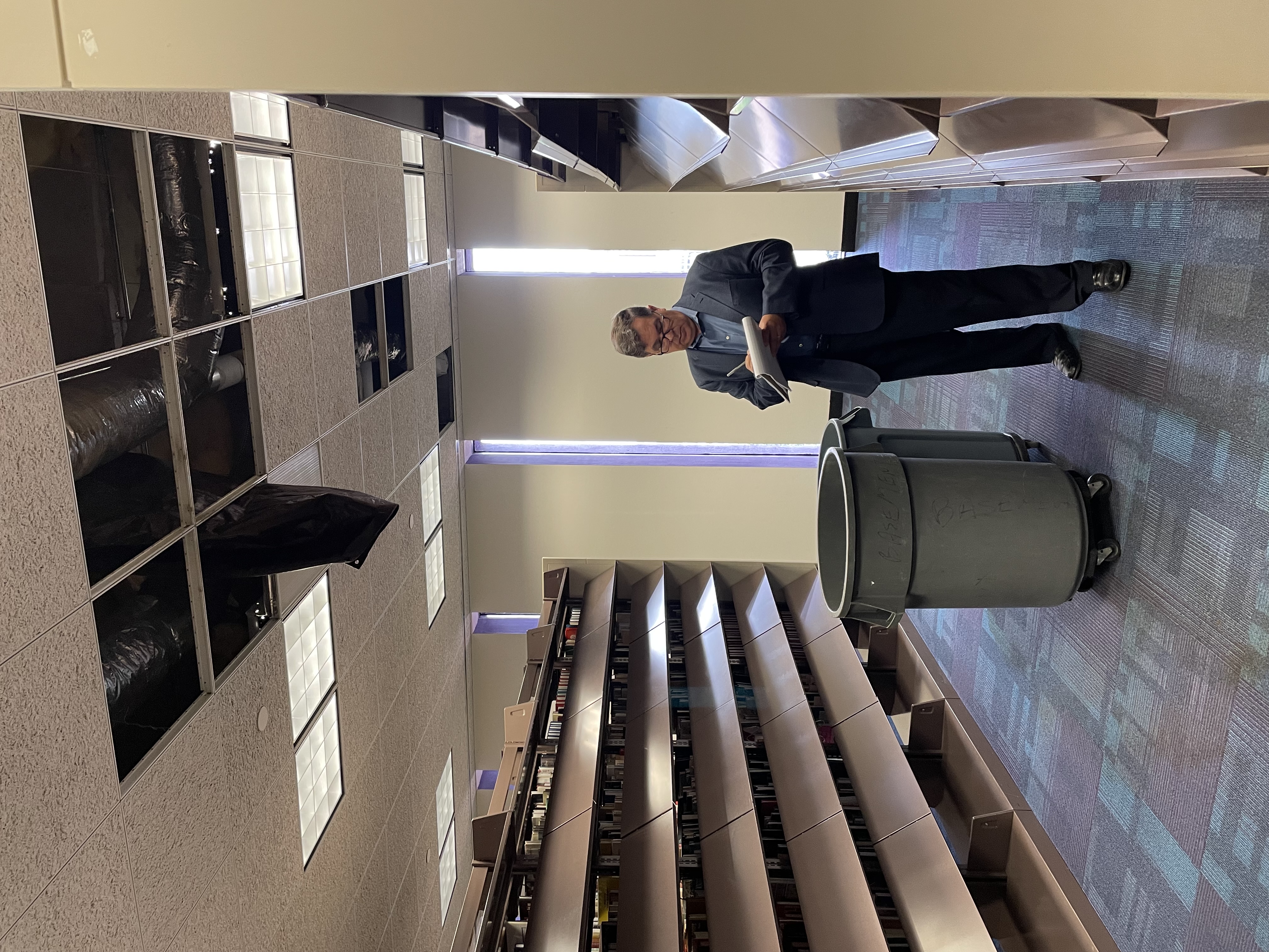 Image of Tom Clarkson while he assesses damage