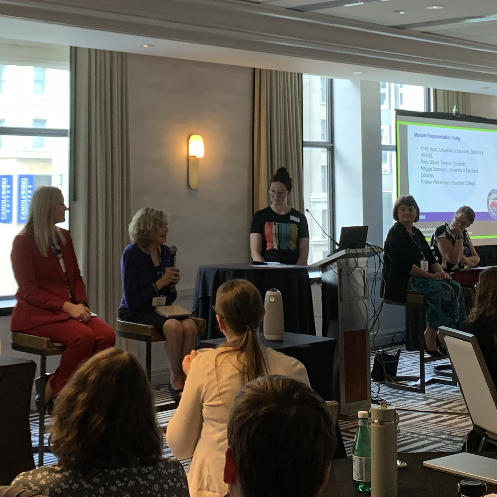 Panelists with Lyrasis' Laura Sinhur.